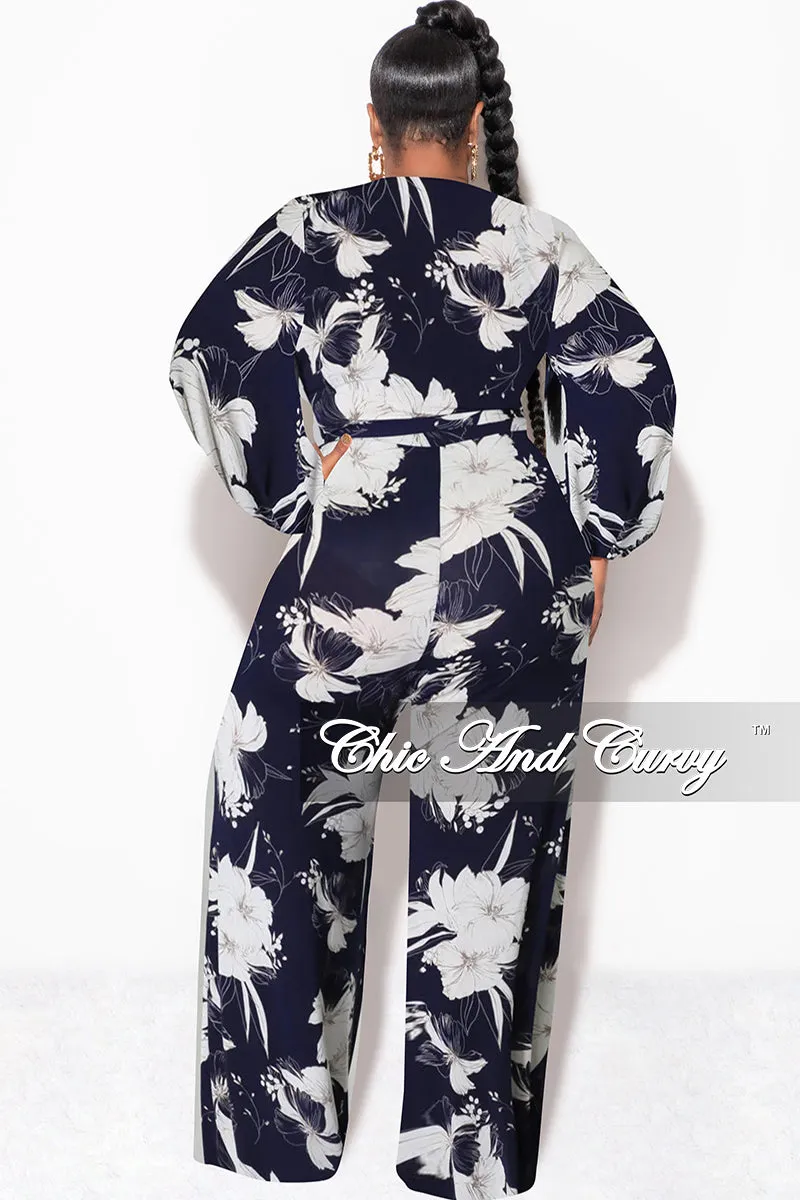 Final Sale Plus Size Faux Wrap Jumpsuit with Waist Tie in Navy and White Floral Print Sustainable Material Blend