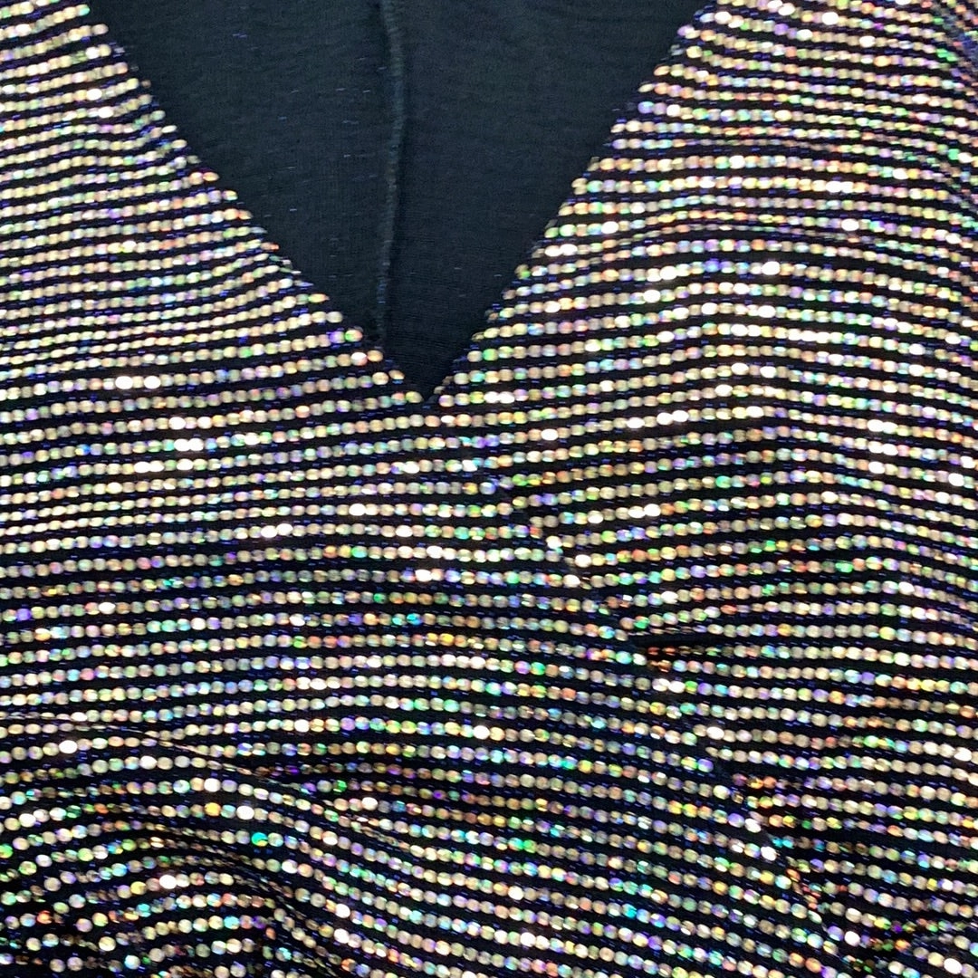 NonChafe Lining Durable Overlock Stitch Final Sale Plus Size Confetti Dot Knit Sequin Faux Wrap Gown With Front Slit In Gold with Black Background