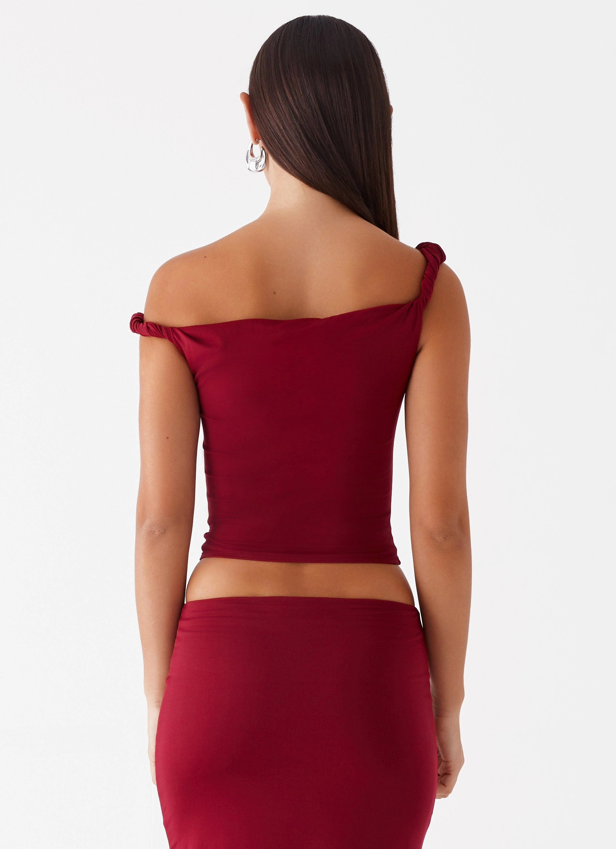 Solace Soul Twist Shoulder Top - Maroon Contemporary Design